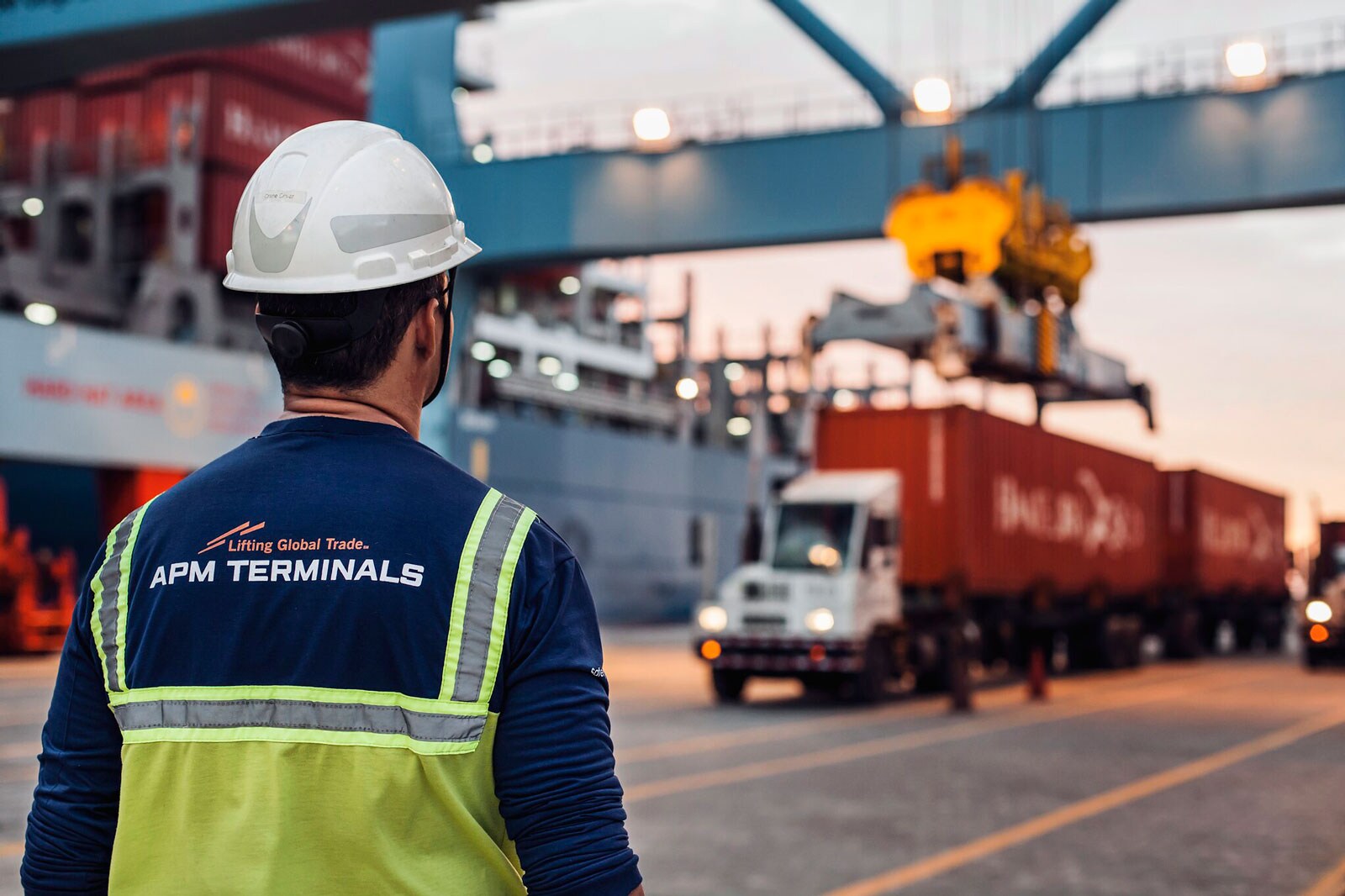 employee-with-vessel-and-truck-1600